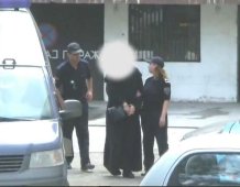 Police puts handcuffs on monks, before the cameras